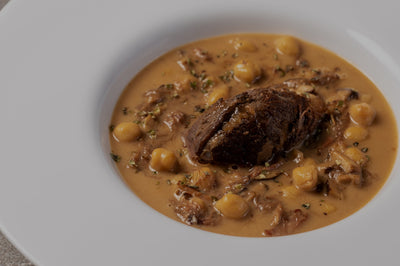 Pedrosillo chickpeas with stewed Iberian cheeks and boletus